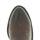 Mid shaft boot in brown with embroidery on the shaft and zipper on the side. View of the toe 