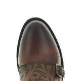 Oxford saddle shoe with floral laser on the vamp. Angled to see toe