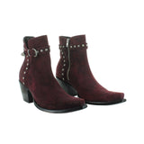 Suede red botin with studs on the counter heel.