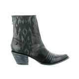 Black botin with geometric design lasered on the side. Botin angled to the right